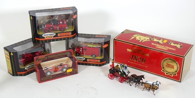 Lot 404 - A group of modern issue diecast vehicles to...