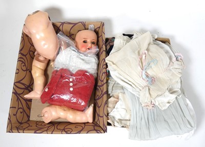 Lot 418 - A collection of doll parts, to include Armand...