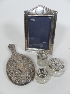 Lot 140 - A silver clad easel photograph frame, h.20cm,...