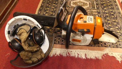 Lot 1075 - A Stihl 026 petrol driven chainsaw, together...