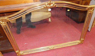 Lot 1102 - A contemporary gilt framed overmantel mirror,...