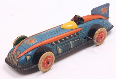 Lot 902 - A Wells Brimtoy clockwork tin plate racing car,...