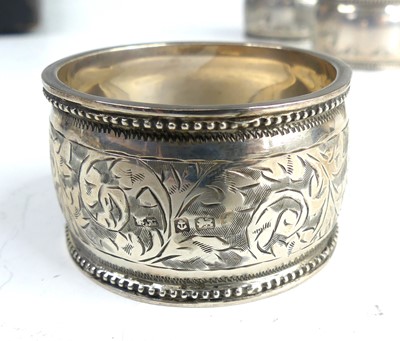 Lot 2105 - A cased set of six Edwardian silver napkin...