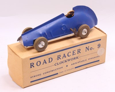 Lot 903 - A Baxtoys tin plate and clockwork model of a...