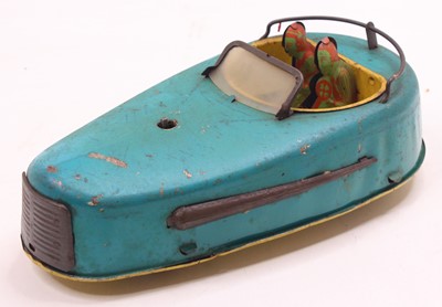 Lot 906 - An early 20th century tin plate and clockwork...