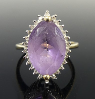 Lot 2630 - A 9ct yellow and white gold, amethyst and...