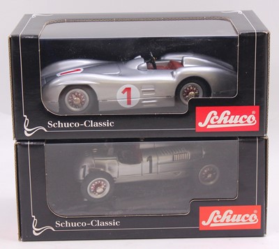Lot 947 - A Schuco Classic reissue tin plate vehicle...