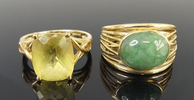 Lot 2634 - Two 9ct yellow gold rings, one being a jadeite...