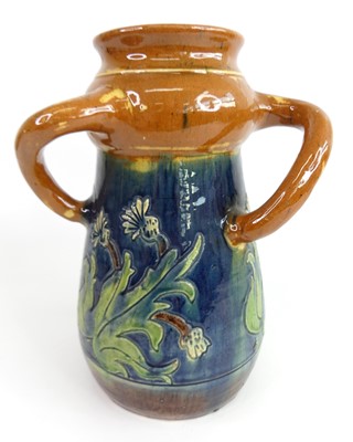 Lot 21 - An early 20th century Devonware pottery...