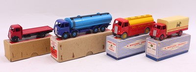 Lot 1450 - A Dinky Toys group of four haulage diecasts to...