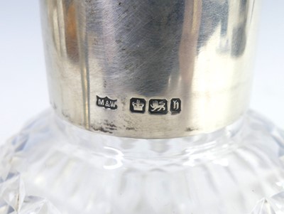 Lot 94 - A circa 1900 silver and glass bodied claret...