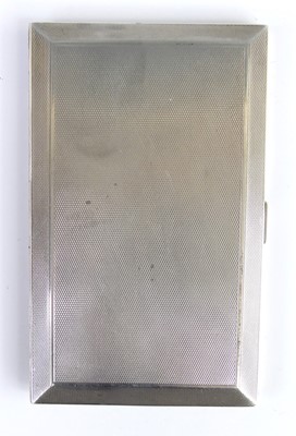 Lot 99 - An Art Deco silver engine turned pocket...