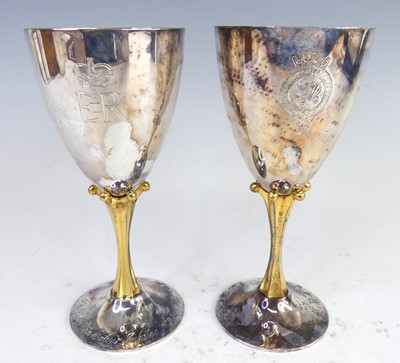 Lot 104 - A pair of silver commemorative footed goblets...