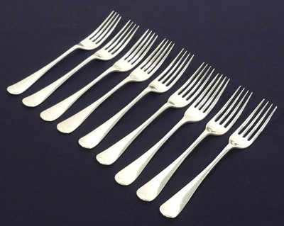 Lot 170 - A matched set of nine silver dessert forks, in...