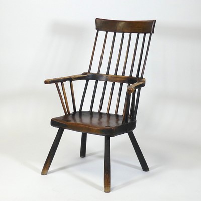 Lot 2540 - A primitive elm and ash comb-back farmhouse...