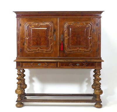 Lot 2501 - A continental walnut cabinet-on-stand, 19th...