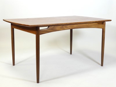 Lot 412 - A 1960s G-Plan 'Fresco' teak extending dining...