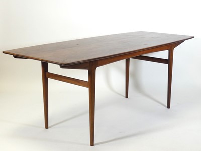 Lot 447 - A 1960s teak dining table, the one-piece top...