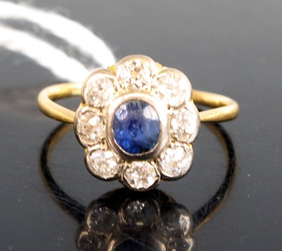 Lot 294 - A yellow and white metal sapphire and diamond...