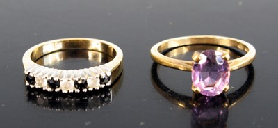 Lot 303 - A 9ct yellow gold amethyst single stone ring,...