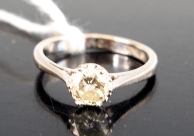 Lot 297 - A white metal diamond solitaire ring, the...