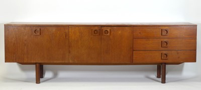 Lot 426 - A 1960s teak long sideboard by Uniflex, having...