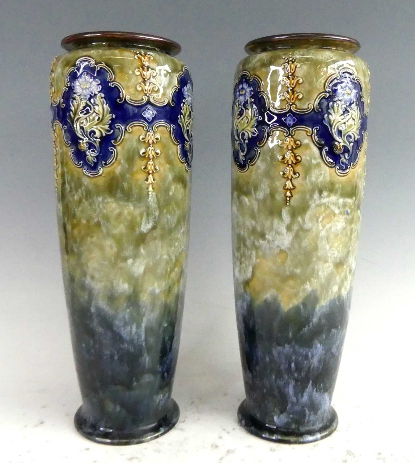 Lot 2077 - A pair of Royal Doulton stoneware cylindrical...