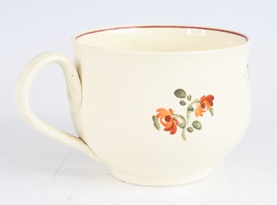 Lot 2050 - A late 18th century creamware mug, decorated...