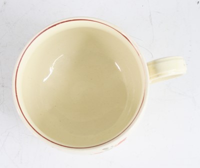 Lot 2050 - A late 18th century creamware mug, decorated...