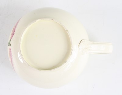 Lot 2050 - A late 18th century creamware mug, decorated...
