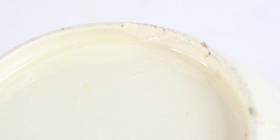 Lot 2050 - A late 18th century creamware mug, decorated...