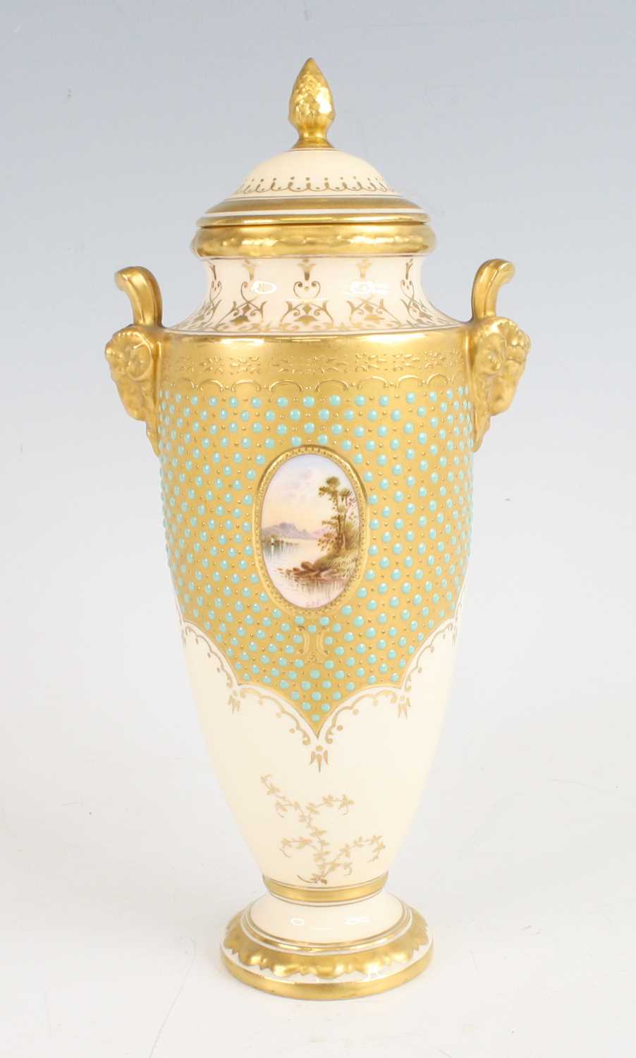 Lot 2053 - A Coalport porcelain pedestal vase and cover,...