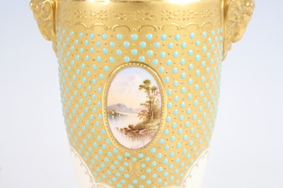 Lot 2053 - A Coalport porcelain pedestal vase and cover,...