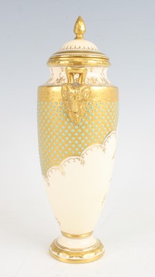Lot 2053 - A Coalport porcelain pedestal vase and cover,...
