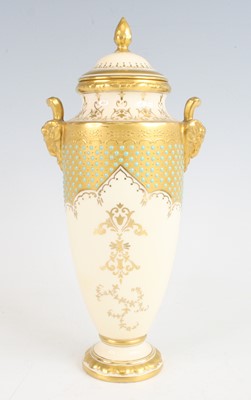 Lot 2053 - A Coalport porcelain pedestal vase and cover,...