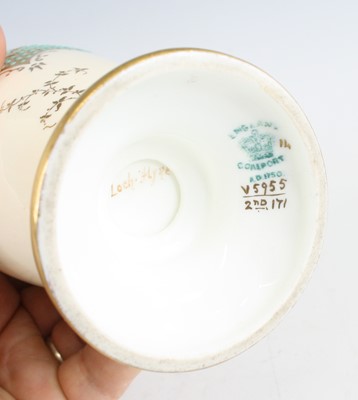 Lot 2053 - A Coalport porcelain pedestal vase and cover,...