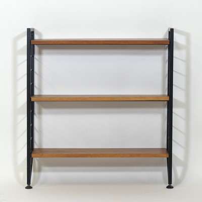 Lot 435 - A 1970s Ladderax teak and black painted metal...