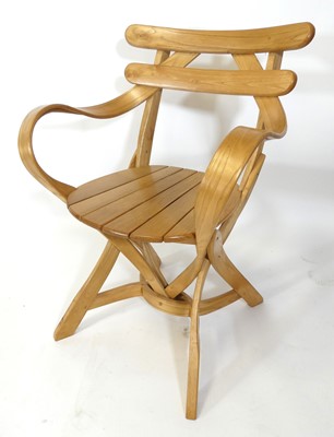 Lot 466 - Dan Hussey - a contemporary blond oak elbow...