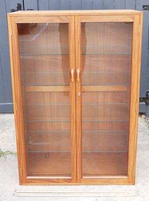 Lot 431 - A 1970s Ladderax teak double door glazed...