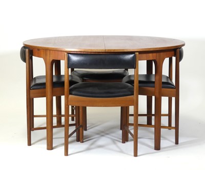 Lot 441 - A 1960s teak dining suite by A.H. McIntosh Ltd,...