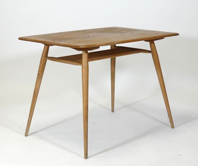 Lot 422 - A 1960s Ercol blond elm and beech compact...