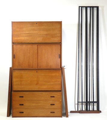 Lot 437 - A 1970s teak modular three-bay wall unit,...