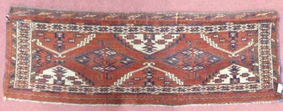 Lot 1191 - A Turkoman woollen Chodor Chuval, 103 x 35cm
