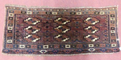 Lot 1185 - A Persian woollen Yomut bagface, 52 x 130cm