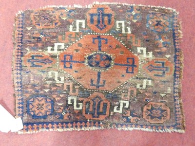 Lot 1195 - A Persian Balouchi bagface, 35 x 58cm (a/f)