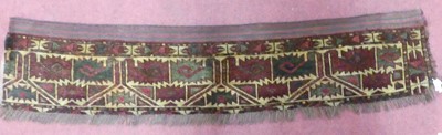 Lot 1175 - A Persian woollen Ersari Mafrash, 32 x 102cm...