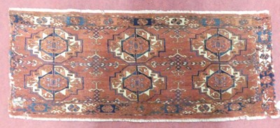Lot 1176 - A Persian woollen Tekke bagface, 38 x 96cm...