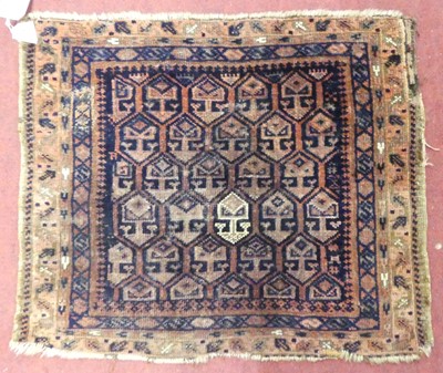 Lot 1178 - A Persian woollen Balouchi bagface, 55 x 65cm