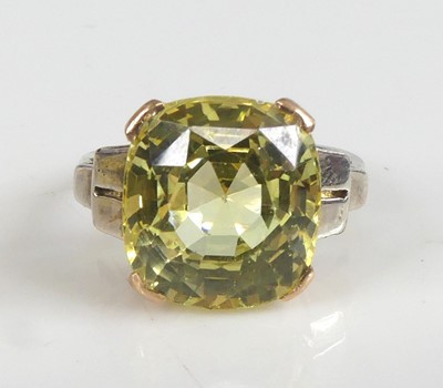Lot 2255 - A yellow and white metal heliodor single stone...