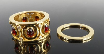 Lot 2306 - An 18ct yellow gold garnet and diamond...